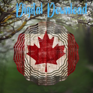 May include: A circular wind spinner with a Canadian flag design. It features a red maple leaf on a distressed wood effect, with wavy green and silver lines. The words "Digital Download" are written in blue.