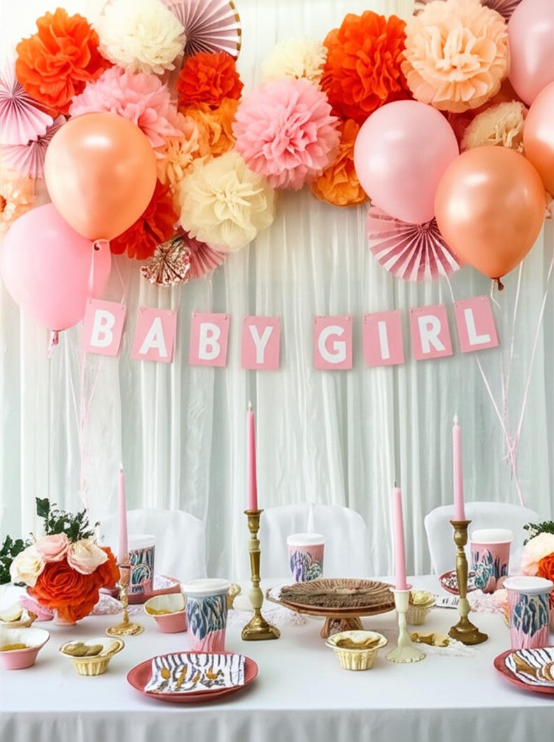 May include: A festive baby shower scene with pink and peach balloons, paper flowers, and a banner that reads "BABY GIRL." The table is set with pink plates, cups, and candles, creating a celebratory atmosphere. Floral arrangements and decorative elements complete the party decor.