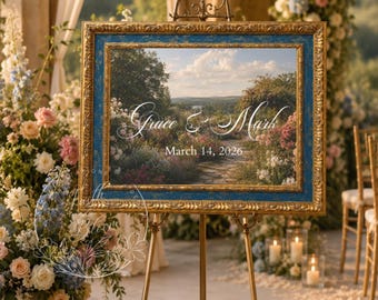 Puede incluir: Un letrero de boda rectangular en un marco dorado y azul ornamentado, exhibido en un caballete de metal dorado. El letrero presenta una imagen de un sendero de jardín y el texto blanco "Grace & Mark" seguido de la fecha "March 14, 2026".