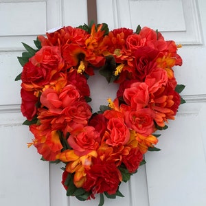 Krans rode oranje hartbloemkrans