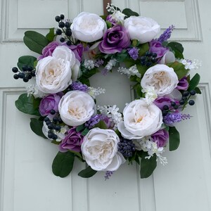 Bosbes, witte en purpere bloemkrans