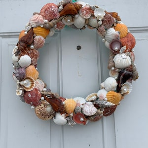 Schelpenkrans met parels