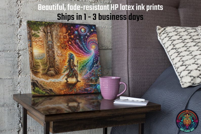 May include: A colorful canvas print featuring a Native American figure walking towards a swirling vortex of light and color. The print is framed and displayed on a wooden table next to a purple mug and a notebook.