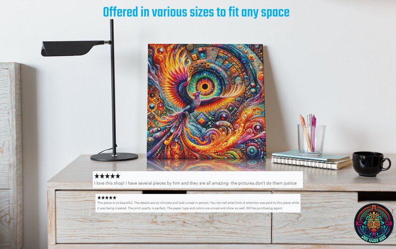 May include: A colorful abstract painting of a phoenix with a large eye in the center. The painting is on a canvas and is framed. The painting is on a wooden table with a lamp, books, and a cup.