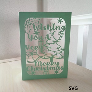 Cartão de Feliz Natal com arquivo cortado SVG