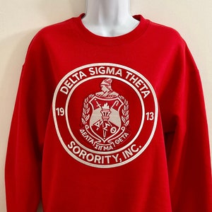 Delta Sigma Theta Round Logo Red and White Sweat Shirt —IS LARGER than usual!   Order one size smaller.