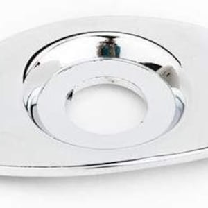 May include: Chrome-plated oval-shaped guitar jack plate with two mounting holes.