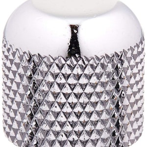 May include: A chrome-plated guitar knob with a diamond-shaped pattern.