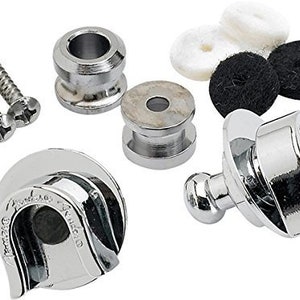 May include: Chrome guitar strap buttons with a locking mechanism. The buttons are designed to be used with a guitar strap.