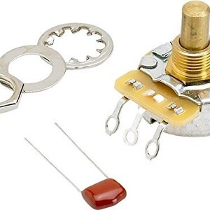 May include: A gold-colored potentiometer with a silver base and three wires. It comes with a nut, two washers, and a red capacitor.