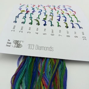 May include: A white card with 10 numbered rows of colorful embroidery floss samples. The card is labeled "The Steady Thread" and "103 Diamonds".