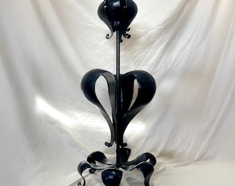 Spanish style bent iron pedestal cander holder