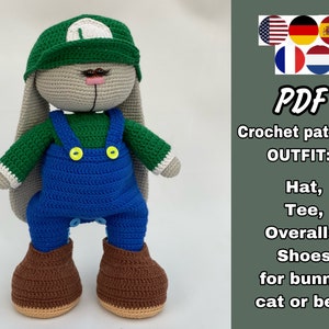 May include: Crochet pattern PDF for a hat, tee, overalls, and shoes for a bunny, cat, or bear. The pattern includes instructions for making a green hat with a white brim, a green tee, blue overalls, and brown shoes.