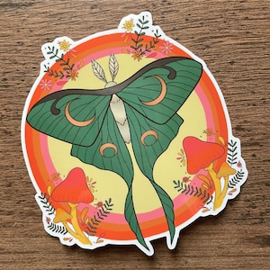 Luna moth sticker with moons, ferns, and mushrooms