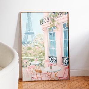 May include: A painting of a Parisian cafe with pink walls and a view of the Eiffel Tower. The cafe has tables and chairs on the balcony, with flowers in vases on the tables.