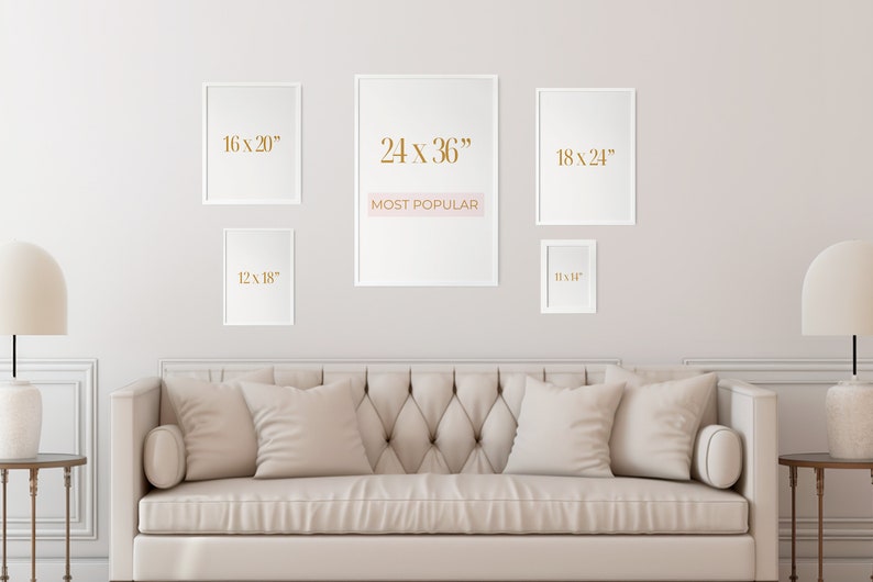 May include: Five white picture frames with different sizes and dimensions displayed on a white wall. The frames are arranged in a staggered pattern. The largest frame is in the center and has the text "24 x 36" and "MOST POPULAR" written in gold. The other frames have the dimensions "16 x 20", "18 x 24", and "12 x 18" written in gold.