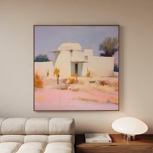 May include: An oil painting of a white building with a domed roof and a small door, set against a pale blue sky. The artwork features a muted color palette with pink and yellow tones in the foreground, and a tree in the background.