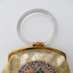 Retro Evening Clutch Vintage 1950s Purse Lucite Hoop Handle Clear Acrylic Boxy Frame Rigid Box Structure Floral Embroidered Beaded Gold Design Transparent Handbag Authentic Midcentury Fashion Statement Piece Collectible Fifties Accessory