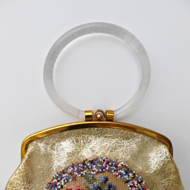 Retro Evening Clutch Vintage 1950s Purse Lucite Hoop Handle Clear Acrylic Boxy Frame Rigid Box Structure Floral Embroidered Beaded Gold Design Transparent Handbag Authentic Midcentury Fashion Statement Piece Collectible Fifties Accessory