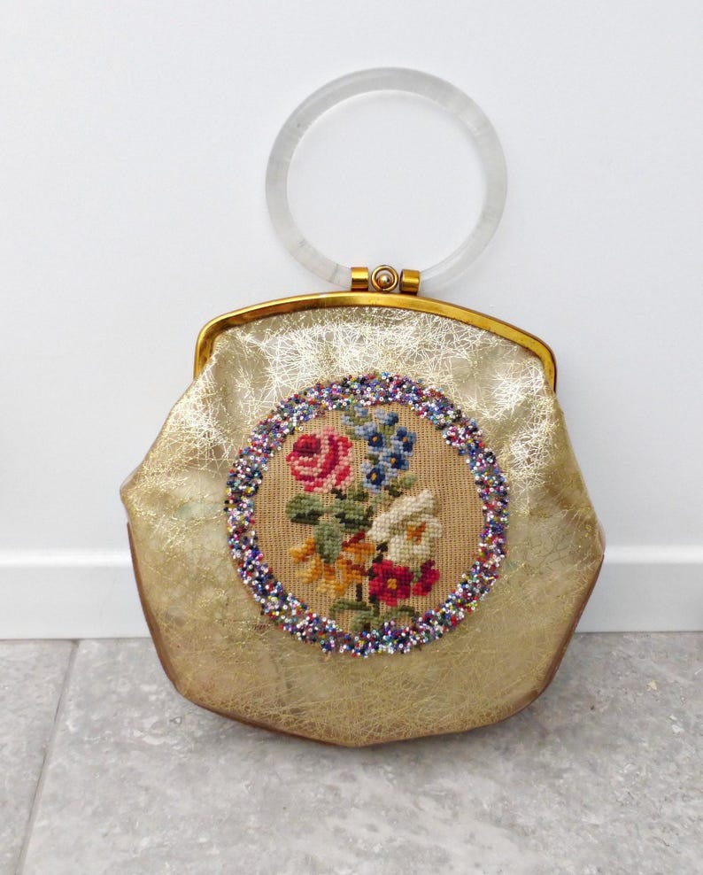 Vintage Lucite Purse Authentic 1950s Handbag Collectible Fifties Style Clear Acrylic Boxy Frame Rigid Box Structure Hoop Handle Design Floral Embroidered Pattern Beaded Gold Diagonal Lines Retro Evening Clutch Statement Piece Midcentury