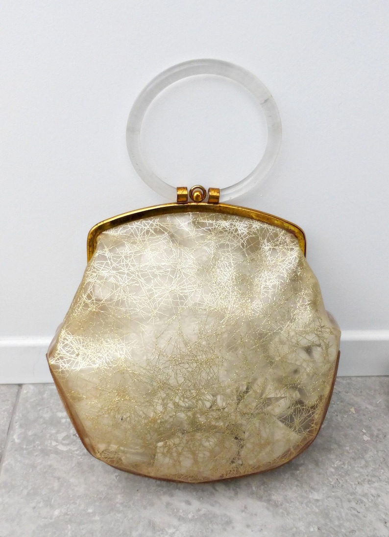 Statement Piece Vintage Purse 1950s Lucite Handbag Clear Acrylic Construction Boxy Frame Rigid Structure Hoop Handle Design Gold Diagonal Pattern Floral Embroidered Beaded Details Retro Evening Clutch Authentic Midcentury Collectible
