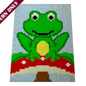 May include: A green frog sitting on a red and white mushroom with a brown stem. The frog has large black eyes and a wide smile. The background is a light blue.