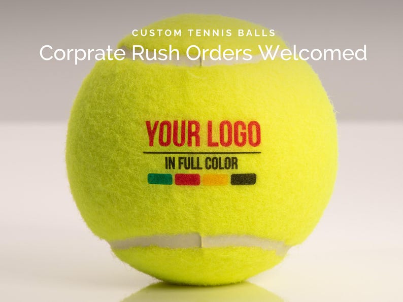 May include: A yellow tennis ball with the text "YOUR LOGO" printed in red and black, and the words "IN FULL COLOR" printed below in black.