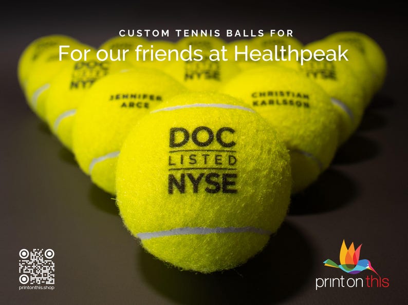 May include: A row of yellow tennis balls with black text. The text on the front ball reads "DOC LISTED NYSE".