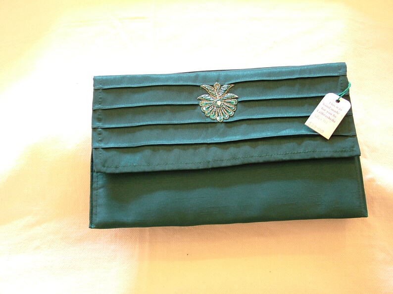 emerald green clutch