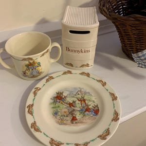 Bunnykins Royal Doulton Tableware Ltd Your Choice Bunnykins Plate, Bunnykins Cup, Bunnykins Bank Your Choice of 1
