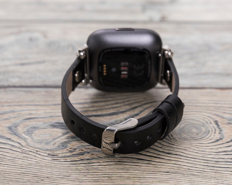 fitbit versa rose gold with black band