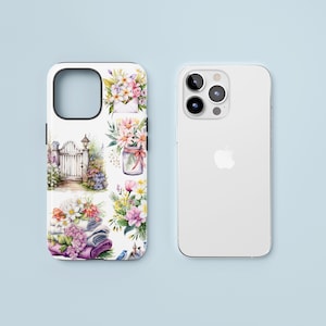 May include: A white phone case with a floral design. The design features a variety of flowers, including roses, daisies, and lilies. There is also a small gate and a jar of flowers in the design.