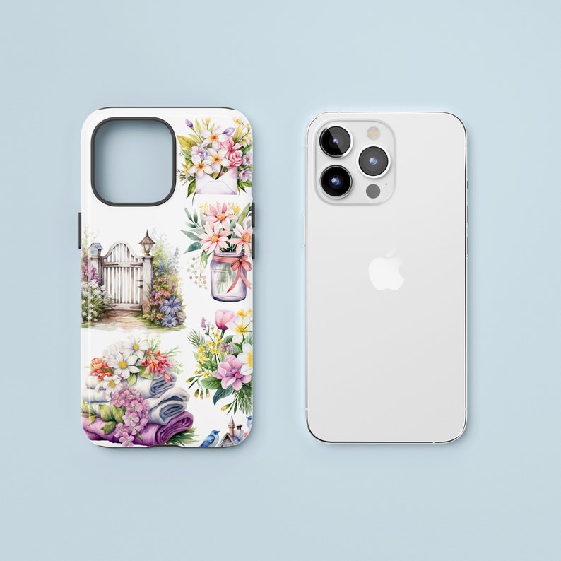May include: A white phone case with a floral design. The design features a variety of flowers, including roses, daisies, and lilies. There is also a small gate and a jar of flowers in the design.