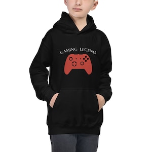 May include: Black hooded sweatshirt with a red video game controller graphic and the text "GAMING LEGEND" in white.