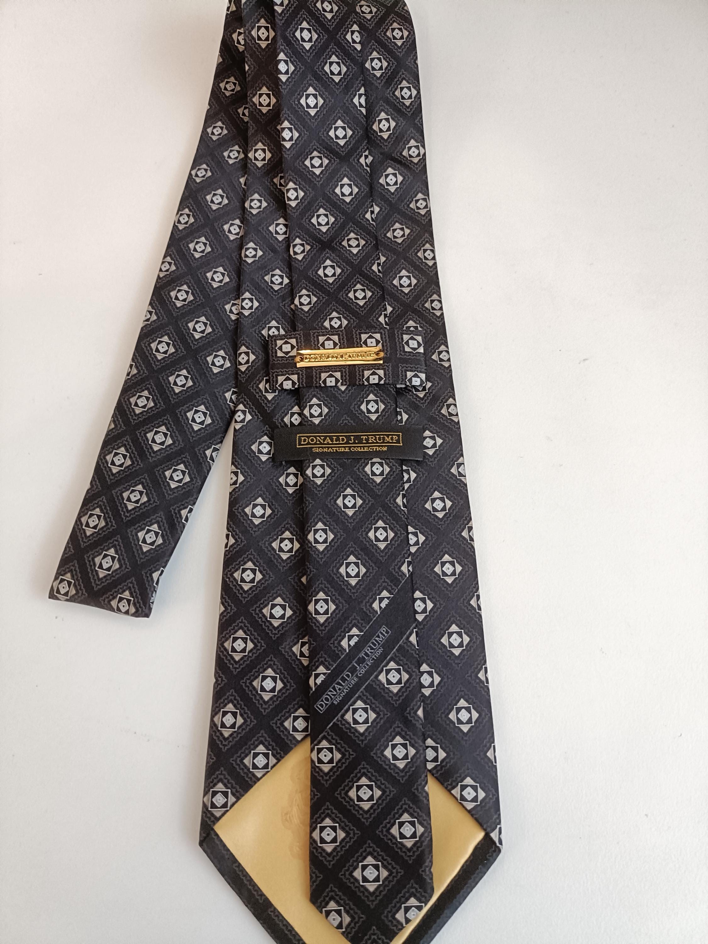 Donald J. Trump, dark gray silk tie.