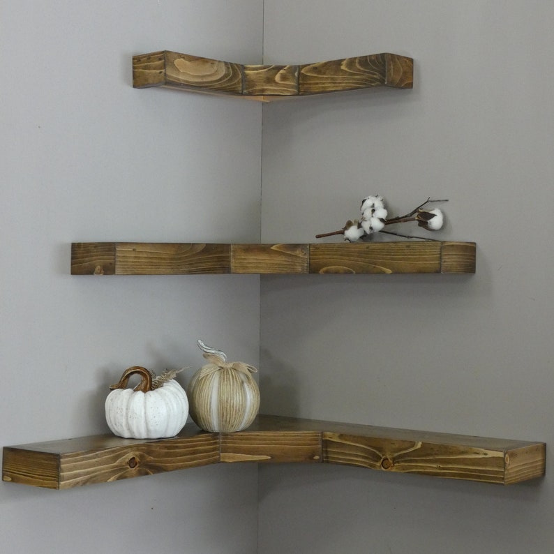 Small space living hacks are the best hacks for those who live in small places. Corner shelves are a great way to utilize space and a fun place for your decor.