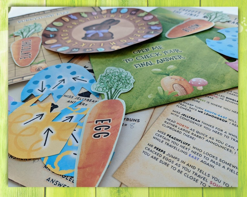 May include: A colorful Easter egg hunt game with instructions on a brown paper background. The game includes a carrot-shaped card with the word "Egg" on it, a blue and yellow card with arrows, and a brown paper envelope with the text "Open me to check your final answer".