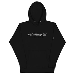 May include: A black hooded sweatshirt featuring the white text MyEye4Design LLC in a script font, with the tagline DESIGN THE LIFE YOU WANT in a smaller sans-serif font below it. A small circular logo is visible on the left sleeve near the cuff.