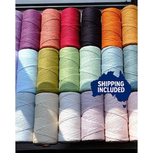 May include: A selection of colourful macramé cord spools in shades like purple, orange, red, black, and green. The spools are arranged to display the texture and colour variations. The image includes the text "SHIPPING INCLUDED".