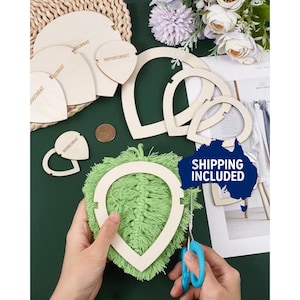 May include: Various unfinished wooden craft shapes, including circles, teardrops, and heart-shaped frames. A green, textured item is being trimmed with blue scissors. The word "BENECREAT" is printed on some of the wooden pieces.