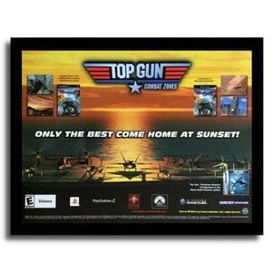 May include: A poster advertising the video game "Top Gun: Combat Zones" for the PlayStation 2, GameCube, and Game Boy Advance. The poster features a sunset scene with fighter jets on an aircraft carrier. The text "Only the best come home at sunset!" is featured on the poster.