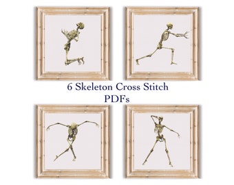 May include: Set of four framed cross stitch patterns featuring skeletons in different poses. The frames are light wood with a white background. The text "6 Skeleton Cross Stitch PDFs" is below the frames.