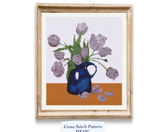 May include: Cross stitch pattern PDF of a bouquet of purple tulips in a blue vase on a brown table.