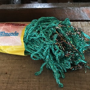 Speckled glitter lurex & viscose destash yarn. Knitting vintage macrame 2mm cord in green colorway