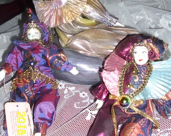 Porcelain Doll Trio: Sofa Display, Colorful Outfits