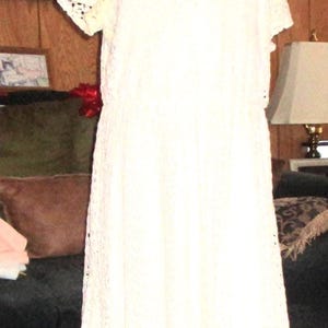 May include: A trio of ceramic mugs with a speckled, matte finish in cream, light grey, and dark grey. Each mug features a simple, minimalist design, ideal for tea or coffee.