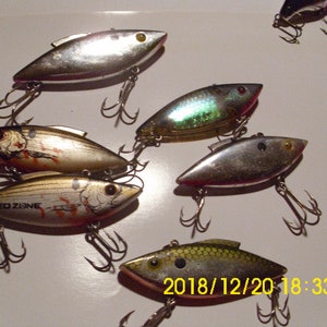 Fishing Lures  Set of Six CrankBaits  A crankbait is a hard plastic bait that resembles a bait fish
