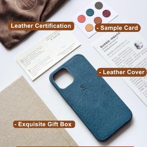 May include: An assortment of items, including a teal leather phone case, a brown flannel bag, sample cards, and a leather certification, are displayed. The phrase "What's in the package?" is printed on a brown label, suggesting a gift set.