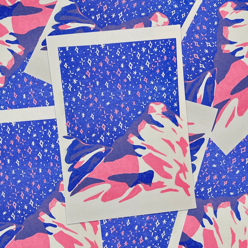 May include: A pink and blue abstract print with a white background. The print features a repeating pattern of stars and diamonds.