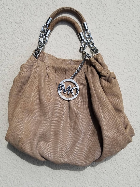 Michael kors purse with mk sales on it